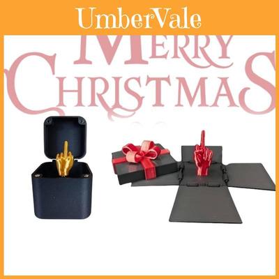 Einzigartiger und kreativer Mittelfinger in einer Schachtel Dekorgeschenk für Weihnachtsfeiern