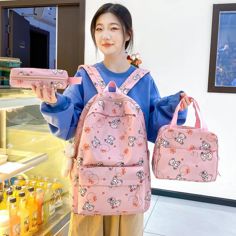 School bag new cute cartoon nylon backpack women's large-capacity middle and high school burden reduction wear-resistant school bag three-piece set
