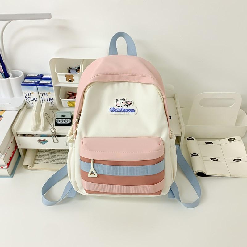 New Small Fresh Contrast Bag Light and Casual Outdoor Backpack High capacity Backpack for Junior and Senior High School Students.
