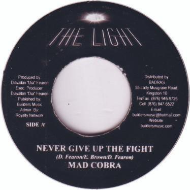 7inch Record MAD COBRA / TAMONE - Never Give Up The Fight / Don't Cry NONE The Light 2003 Jamaica Reggae, Ska & Dub Used