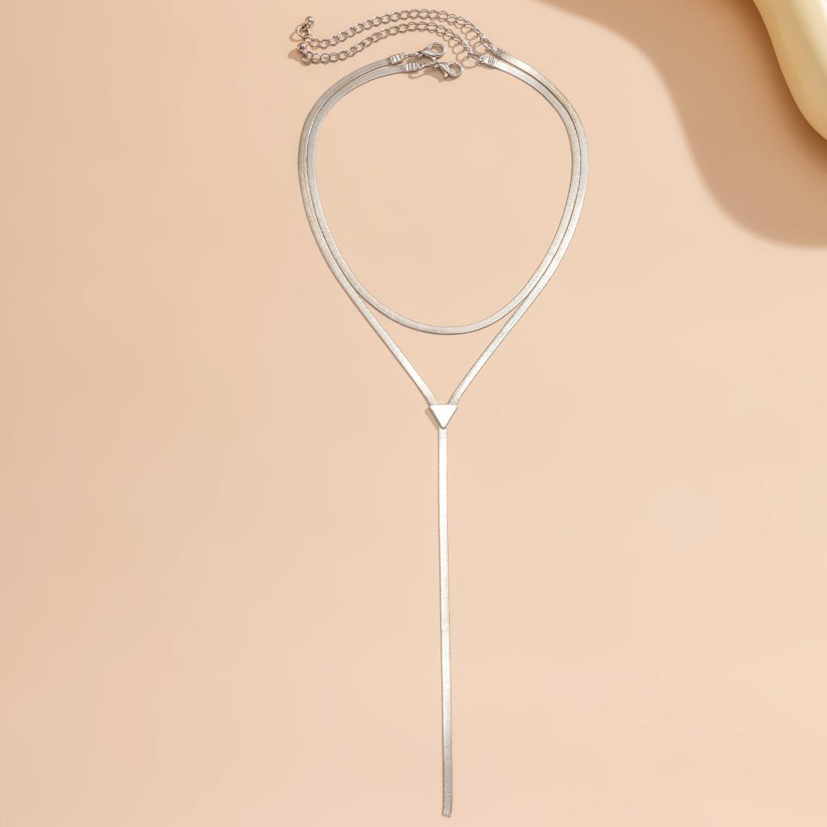 

Аксессуары Простая длинная цепочка-свитер Высокое чувство Универсальная модная цепочка на ключицу Кисточка Многослойное ожерелье Женщины