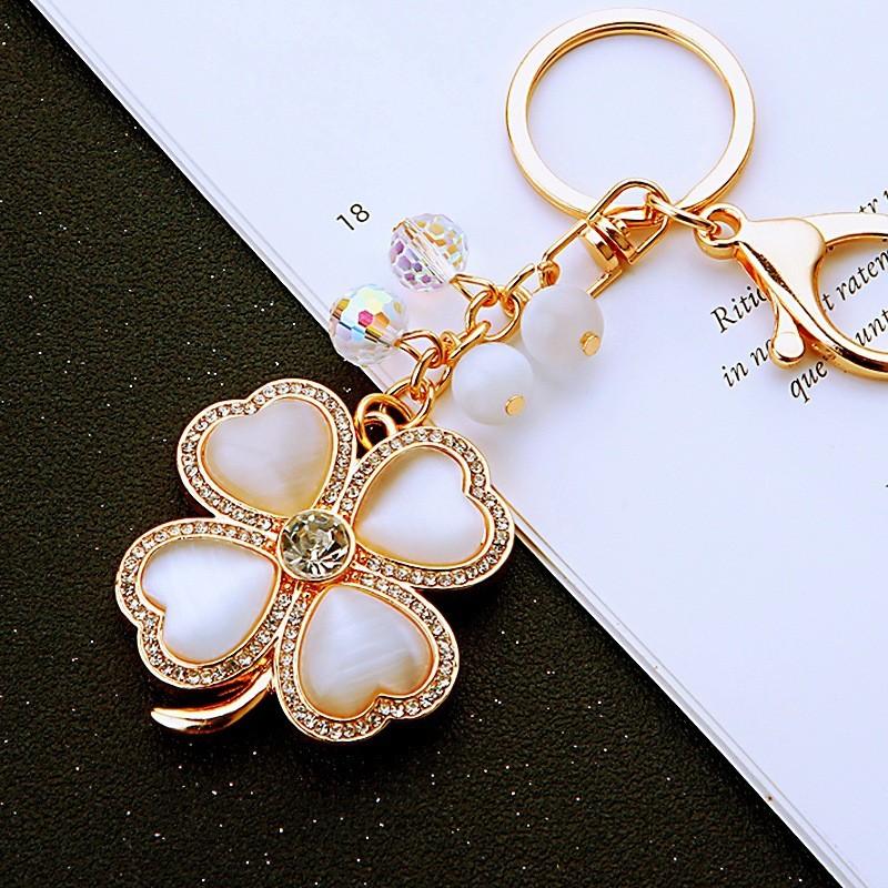 

Глаз кошки Металл Четырехлистный клевер Брелок Подвеска для автомобиля, сумки, модная White