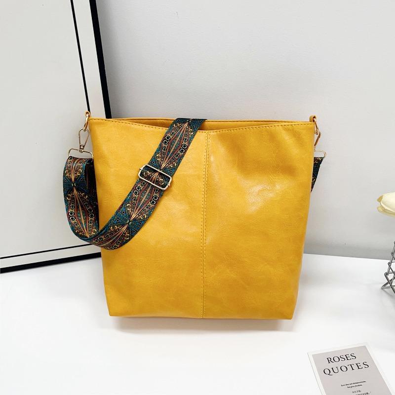 Large-capacity Bag Women's Spring and Summer New Retro Broadband Shoulder Messenger Bag Premium Texture Commuter Bucket Bag