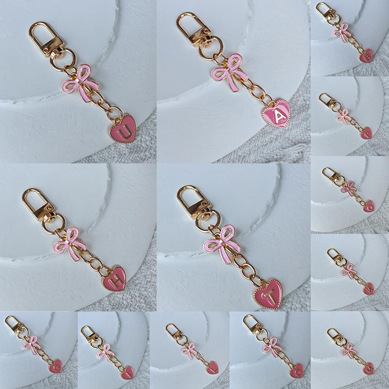 Creative Letters Metal Pink Bow Keychain Fashion A-Z 26 Letters Keyring Charms Mobile Phone Key Holders Bag Accessories Gift