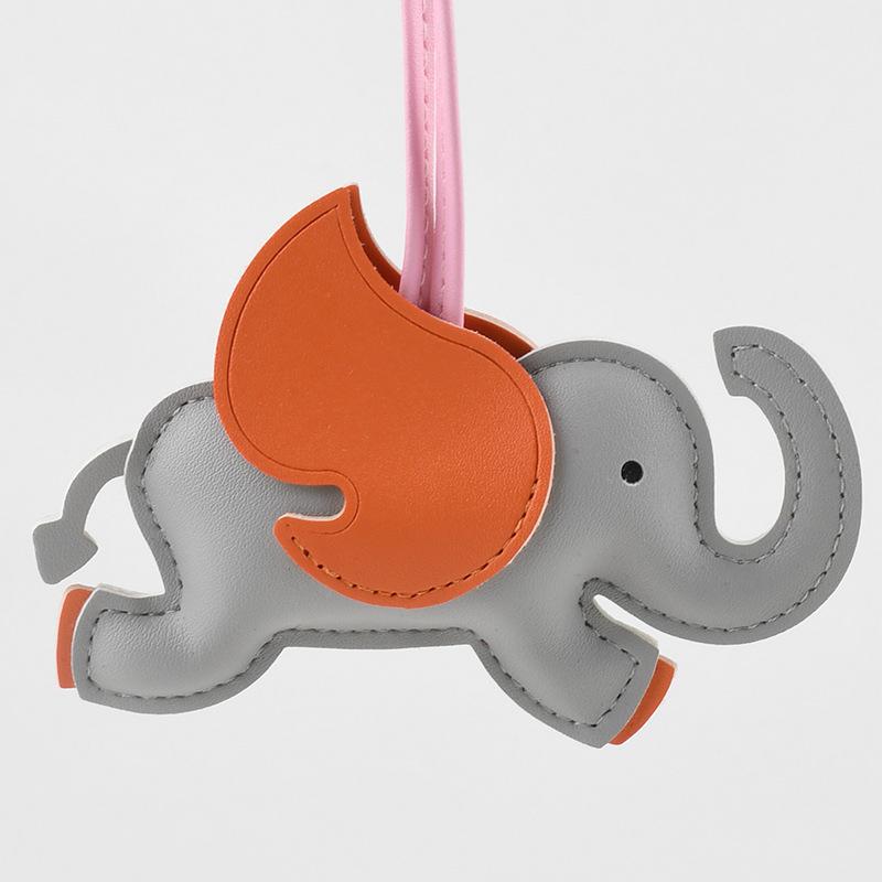 Maskottchen Elefant Benutzerdefiniertes LOGO Schlüsselanhänger Blankes Leder Lasergravur Autoschlüsselanhänger 3D Niedlicher Fliegender Elefant Personalisierter Anhänger Geschenk