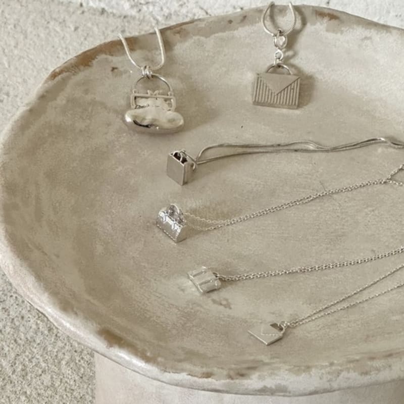 THE BORING mini bag necklace