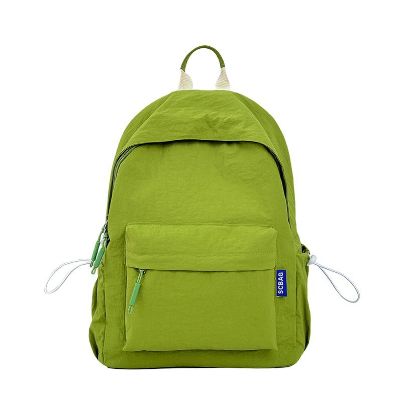 

2025 new solid color lightweight backpack ins style niche versatile women s schoolbag fashionable and simple for junior and high school students single bag (without pendant) зелений