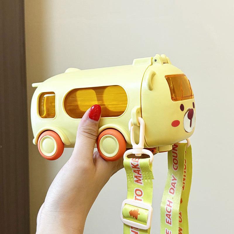 High-Capacity Children's Pop-Up Straw Water Cup - Portable Baby Bus Design