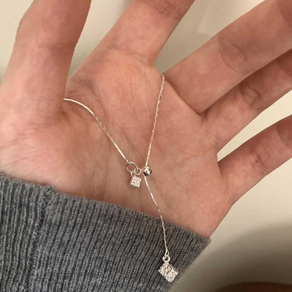 

Textured Square Sliding Pendant Necklace For Women Minimalist Elegant Stylish Versatile Sweater Chain Light Luxury Unique Design