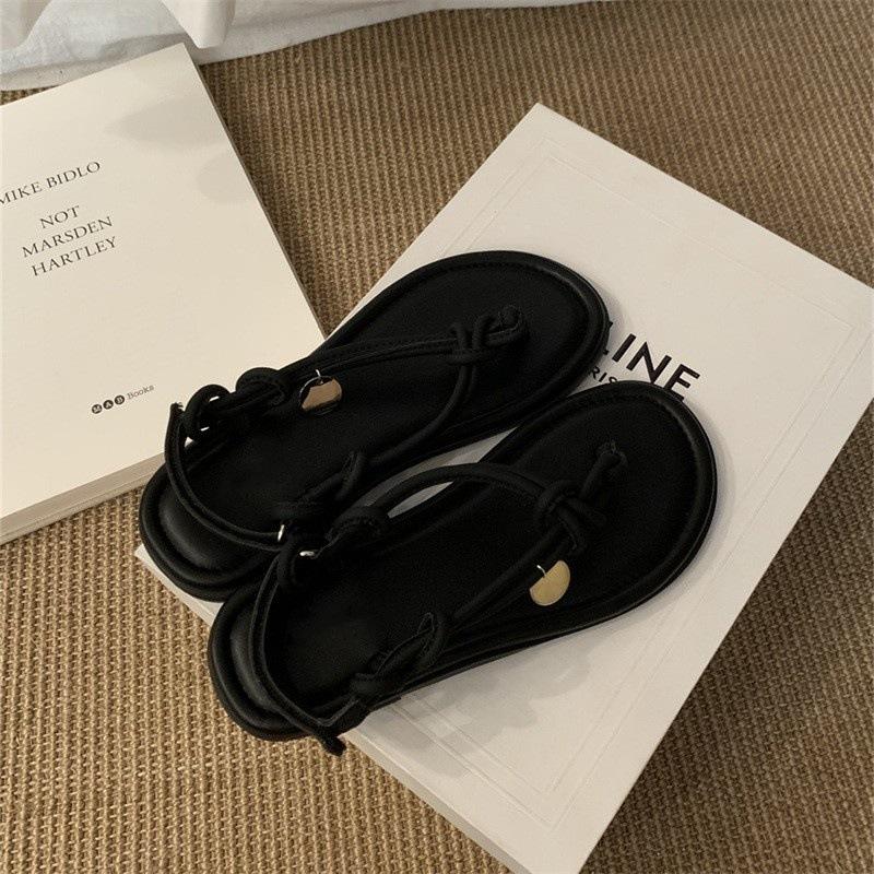 

Korean flat toe sandals women s 2025 summer new fashion high sense woven beach Roman shoes 35