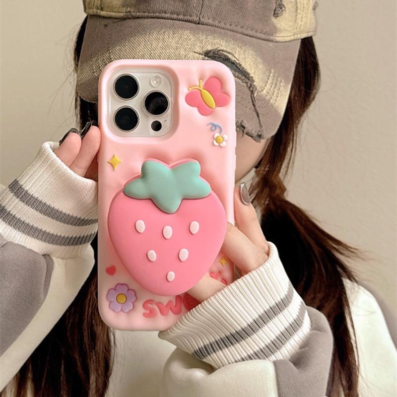 Cute 3D Cartoon Strawberry Hand Grip Holder Soft Silicone Case For iPhone 16 15 13 14 Pro Max Shockproof Back Cover