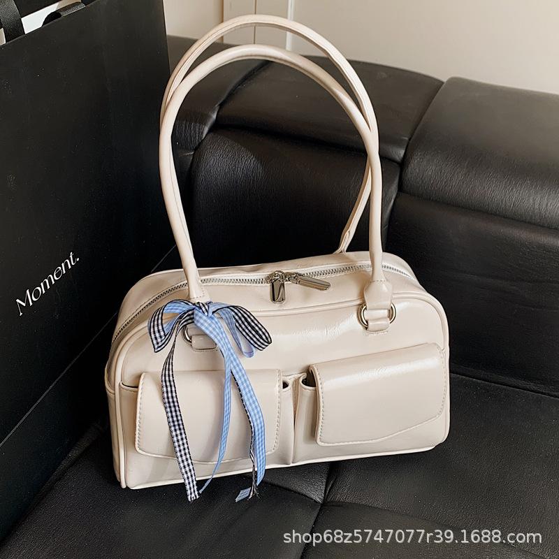 Korean Internet celebrities with the same bowling bag 2025 new niche Boston shoulder bow portable underarm women's bag