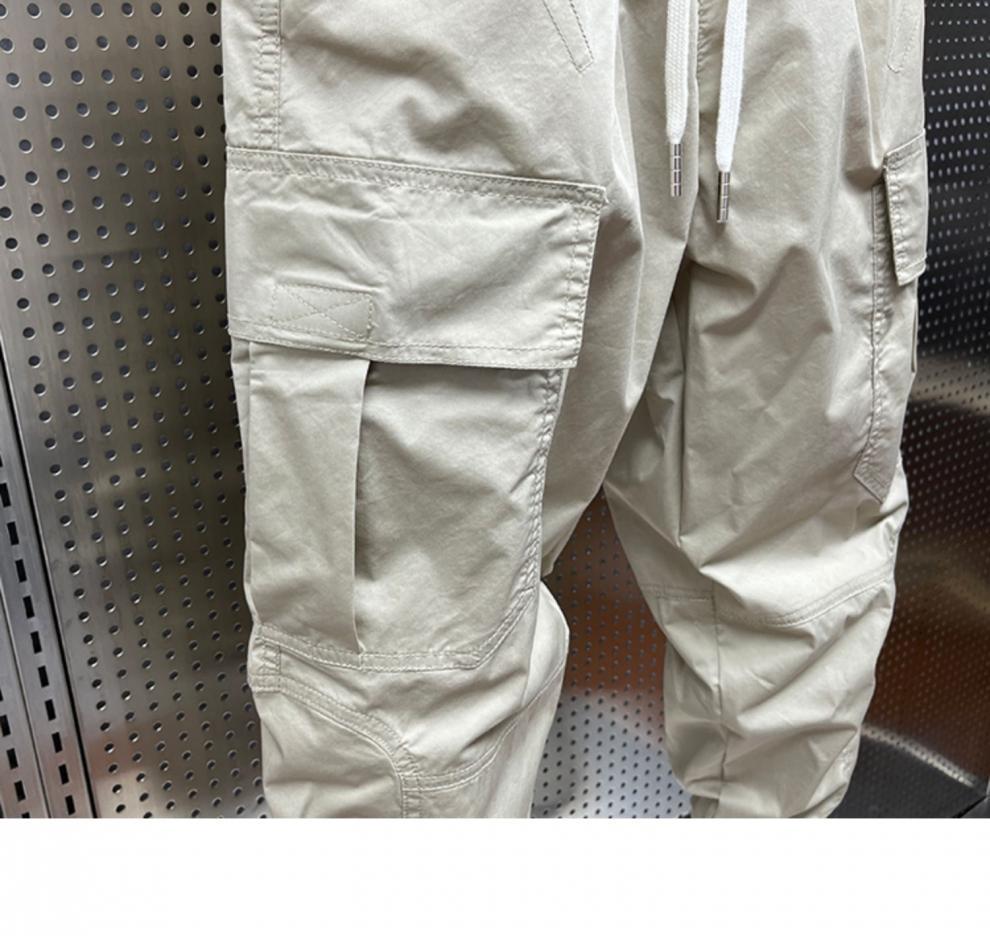 Men's Tapered Quick-Dry Elastic Cargo Pants with Drawstring, Multi-Pocket, Casual Trendy 9-Point Style for Spring and Autumn.