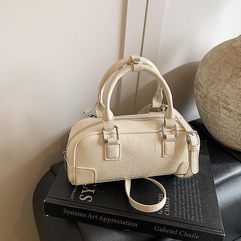 

Летняя популярная маленькая толпа Сен Мэн в этом году 2025 маленькая сумка женская сумка-подушка сумка через плечо портативная повседневная новый дизайн