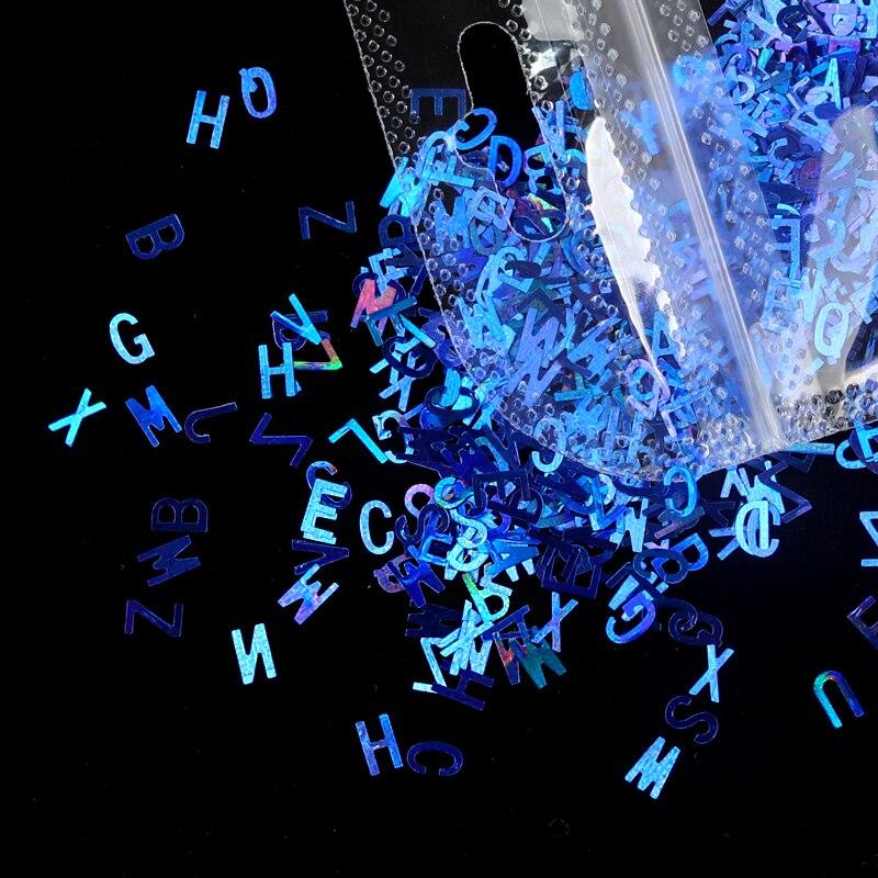 

2 г/пакет. Голографічні блискітки для нігтів. Блискітки. Лазерна стрічка. Пластівці у формі літери. 3D. Барвисті прикраси для нігтів. Аксесуари.