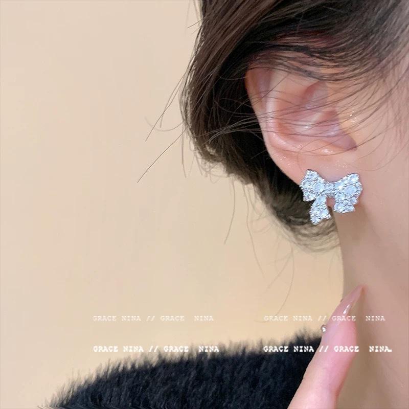 Full diamond bow stud earrings New Year's popular temperament light luxury niche high-end earrings unique earrings women