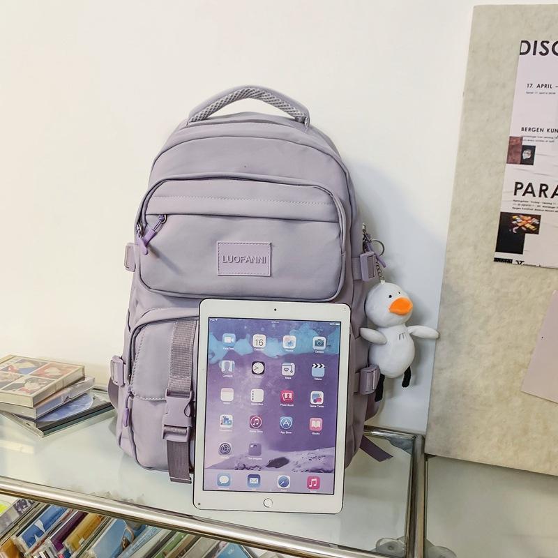 Solid color multi-pocket schoolbag female Korean version high school college student backpack light color couple large capacity ins backpack