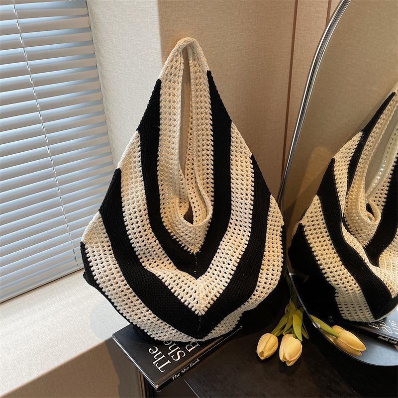 Niche woven lazy wind shoulder bag women's new holiday beach bag large-capacity commuter bag