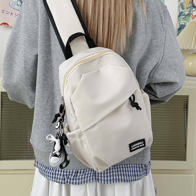 Schoolbag Korean version of simple small backpack versatile messenger bag men's casual men's sports breast bag women's large-capacity student shoulder
