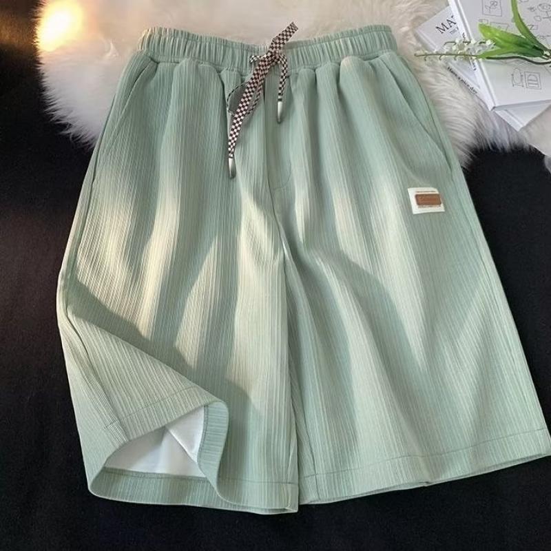 

Весенне-летние модные свободные повседневные шорты из ледяного шелка, универсальные однотонные прямые спортивные шорты, мужские большие размеры M зелёный