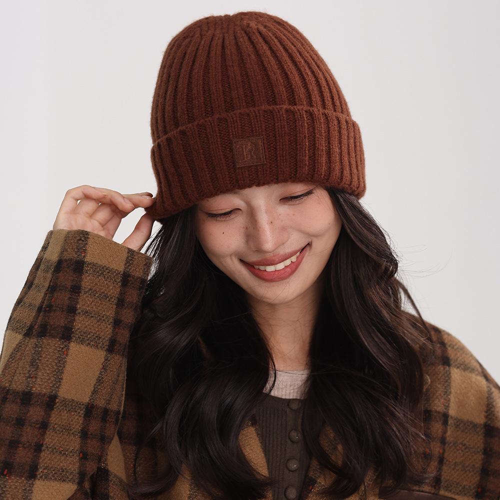 

0% wool hat women s autumn and winter loose wool hat new warm advanced sense solid color crimping ear protector cold hat women 24*27cm