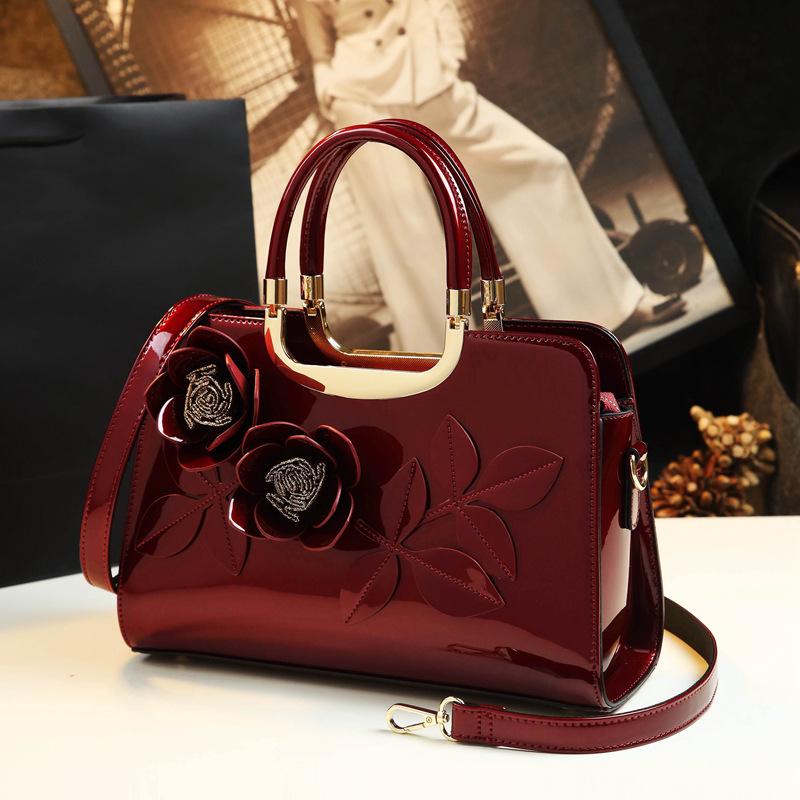 

Новая модная женская сумочка с цветочным принтом бордовый