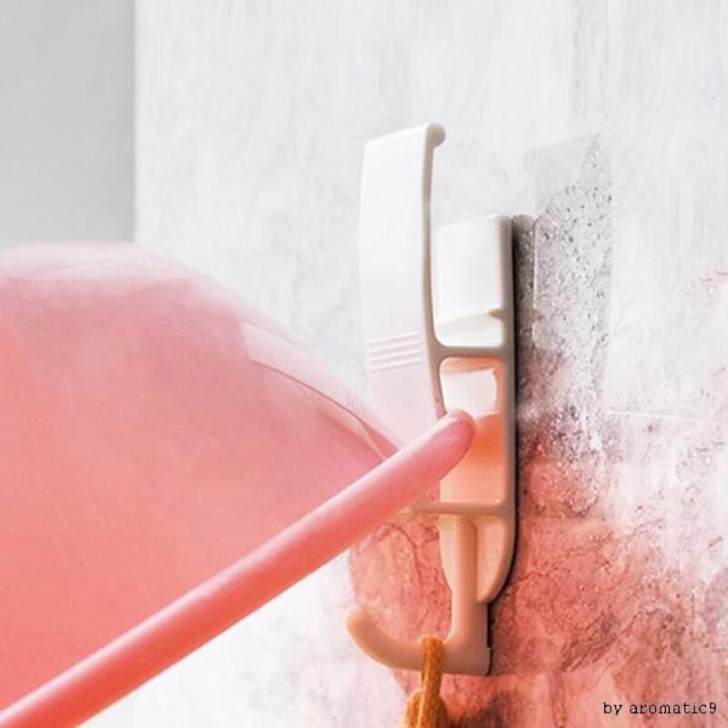 Bathroom space-saving washbasin with a multi-purpose, non-perforated 3-tier hook
