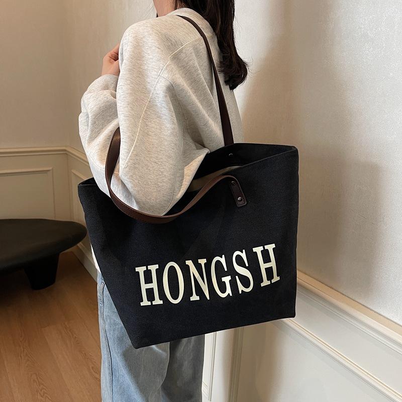 Large capacity canvas simple shoulder bag female college student casual fashion simple tote bag hand carry portable commuter bag