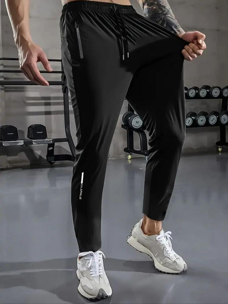 Herren Freizeit-Sporthose, Hochdehnbare Webware, Einfarbig, Normale Passform mit Kordelzugbund und Reißverschluss