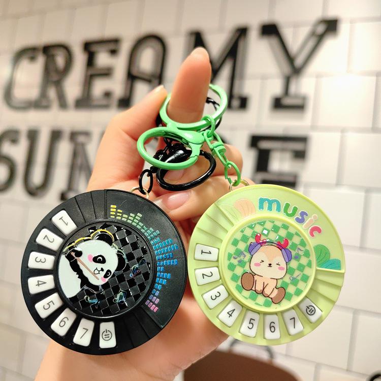 Mini Guitar Keychain with DJ Scratch Sound - Fun Musical Schoolbag Toy for Kids