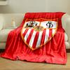 A shield with red and white stripes, icons, a football, and "SFC" initials. for all seasons blanket lunch break throw gift