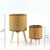 Handcrafted Yellow Rattan Plant Stand Durable And Portable Holder For Showcasing Green In Homes Offices Or Patios