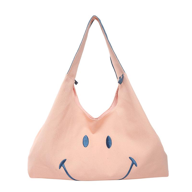 

Весенне-летняя оптовая нишевая дизайнерская вышитая сумка-тоут с улыбающимся лицом, женская универсальная сумка через плечо большой вместимости для поездок на работу розовый