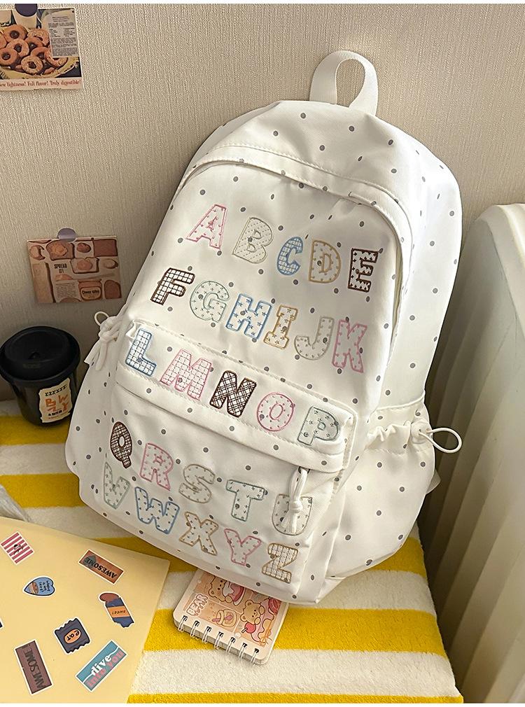 Schoolbag1011 summer new schoolbag female junior high school high school students large capacity niche ins backpack Korean version alphabet computer