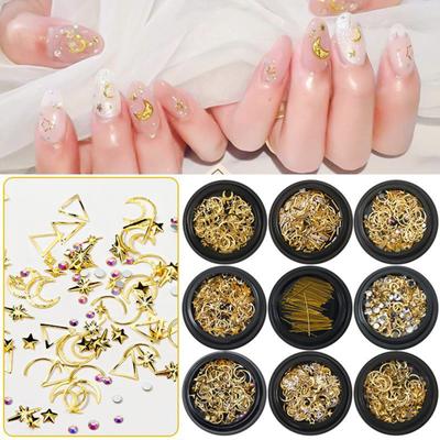 1 scatola fai da te decorazione per nail art scava fuori lega stella luna triangolo fiocco 3D glitter strass charms nail art gioielli accessori misti