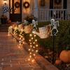 Illuminated Courtyard Decorations Solar Christmas Santa Yard Light Witch Skull Projection Garden Stake Lamp with Outdoor Lawn Ornaments for Halloween