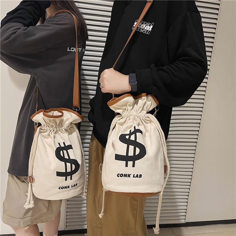 The same canvas bundle bag new trendy 2025 portable storage drawstring single shoulder double shoulder bucket bag fashion