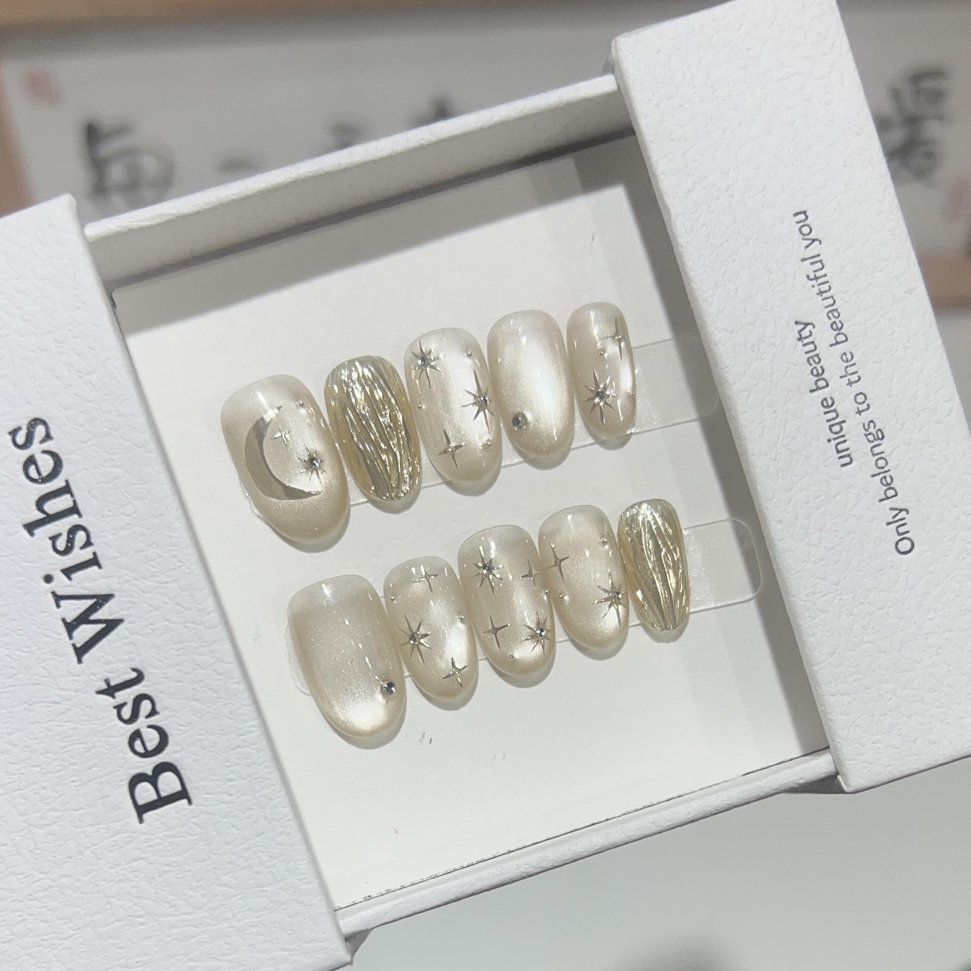 

Ежедневные короткие глянцевые «кошачий глаз» носимые доспехи, расписанные вручную, волшебное зеркало, накладные ногти в виде четырехконечных звезд, съемные Large L