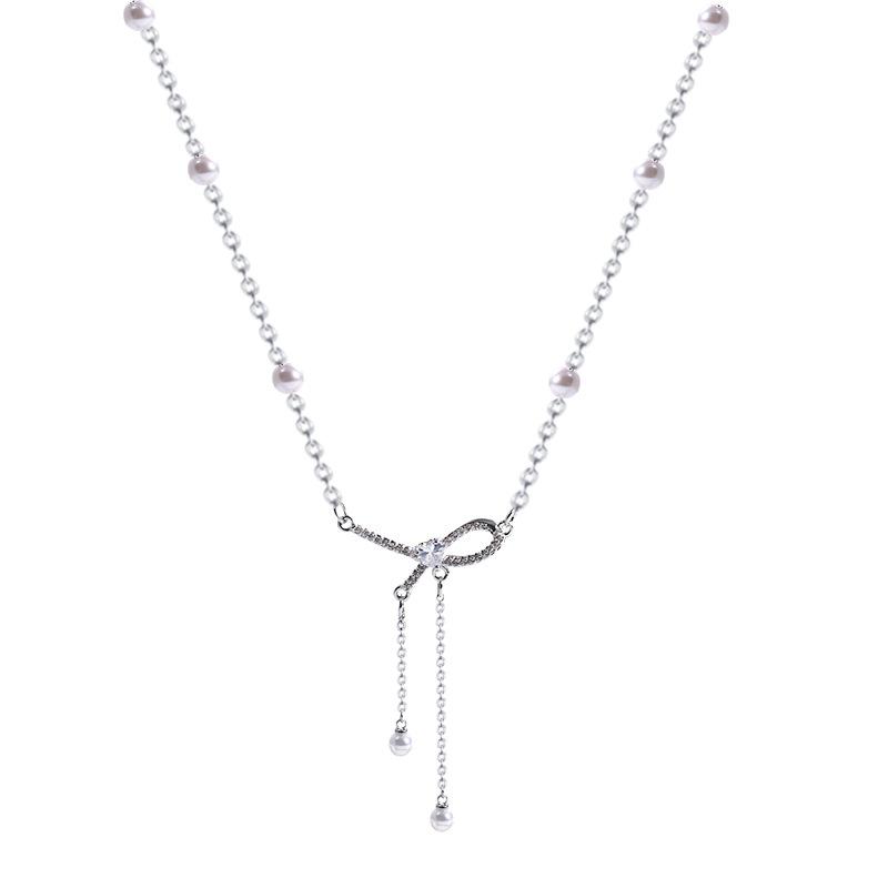 Bow pearl fringed necklace women's light luxury design titanium steel neck chain Internet celebrity collarbone chain
