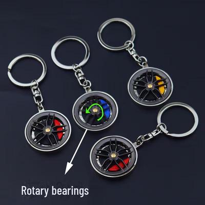 Innovativer Schlüsselanhänger mit Radnabe aus Metall, mit rotierender Bremsscheibe und Bremssattel