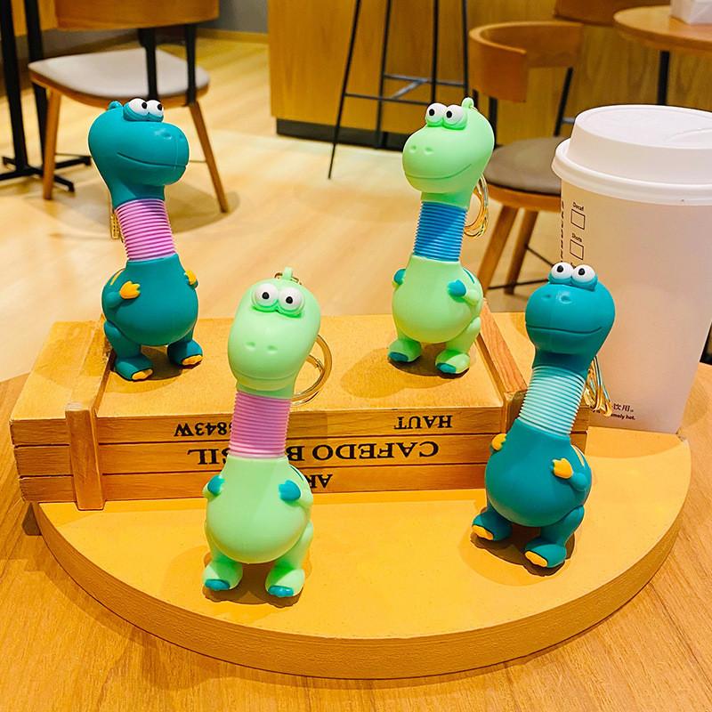 Adorable Cartoon Dinosaur Keychain Retractable Spring Pvc Toy For Kids And Couples