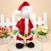 Babbo Natale di Natale con la figura di un fianco contorto che canta giocattoli elettrici per bambini
