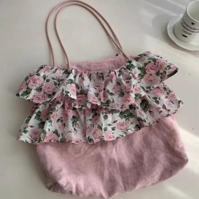 Die Blumentasche ist eine Nischen-Kunsttasche und eine vielseitige Einzel-Schulter-Hand-Tragetasche