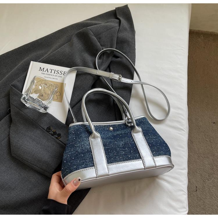 

Trendy portable bucket bag women s 2025 new contrasting color canvas splicing shoulder bag fashion messenger bag