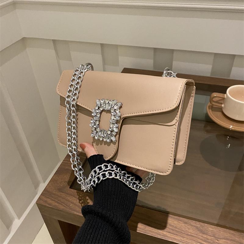 

Женская мода 2025 года: Сумка-мессенджер в стиле вестерн с цепочкой и замком Diamond Lock хаки