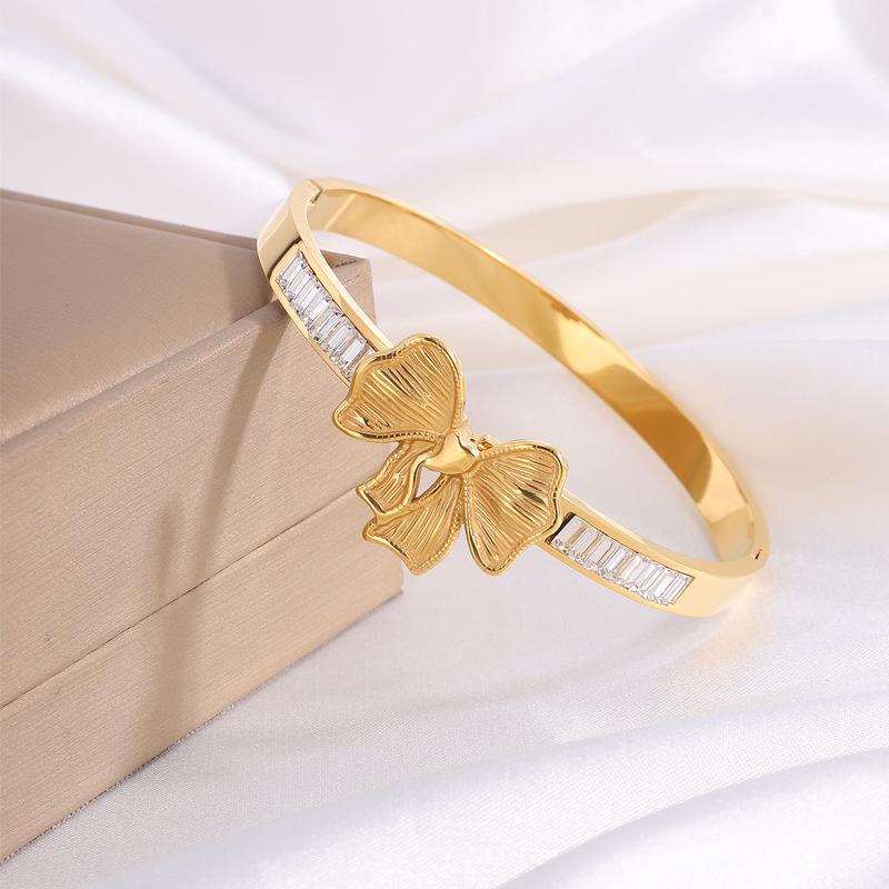 Titanium steel , European and American fashion bow diamond , girls' advanced sense of light luxury, non-fading butterfly
