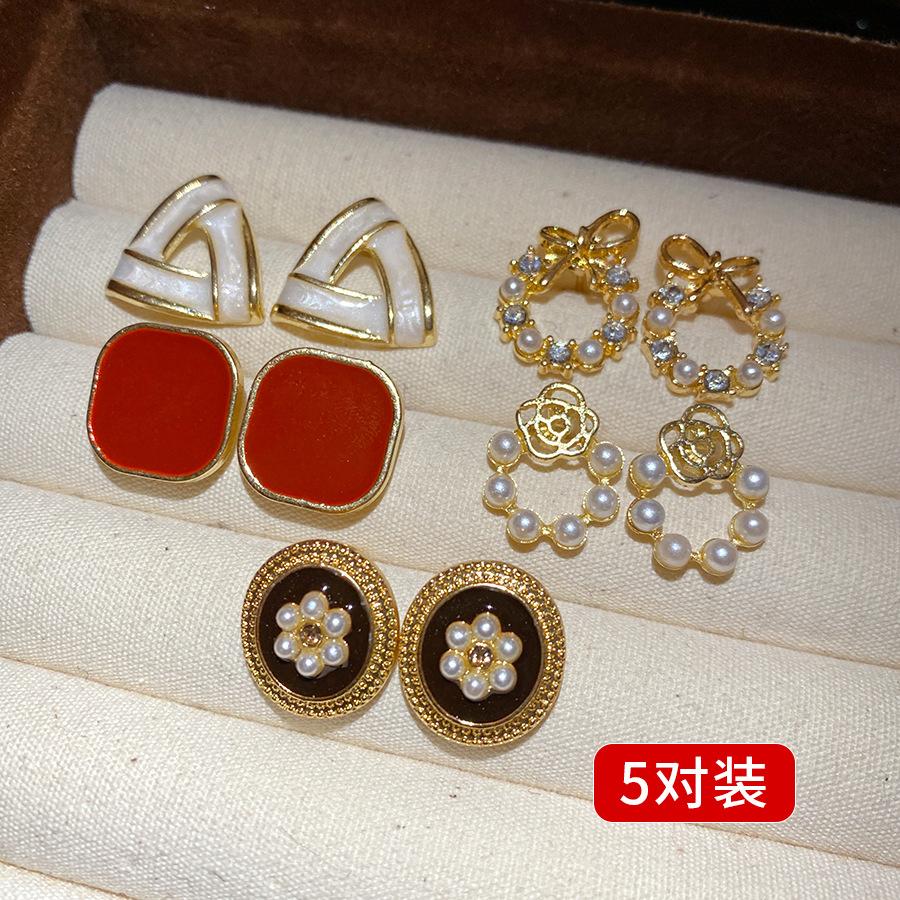

Silver needle oil drop pearl earrings ten-piece set niche individual cold wind earrings light luxury high temperament earrings women