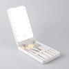 Portable Makeup Mirror With 5 Brushes Storage Box Rotatable LED Touch One-Face Storage Box Foldable Compact Makeup Mirror