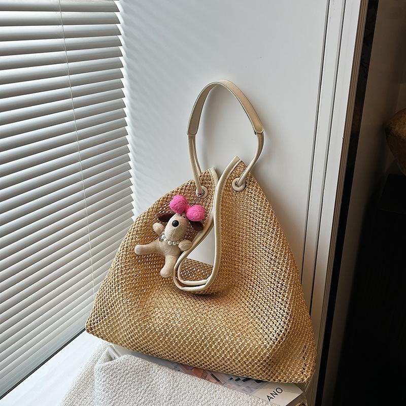 Seaside vacation bag women's new woven tote bag large capacity casual versatile shoulder armpit bag