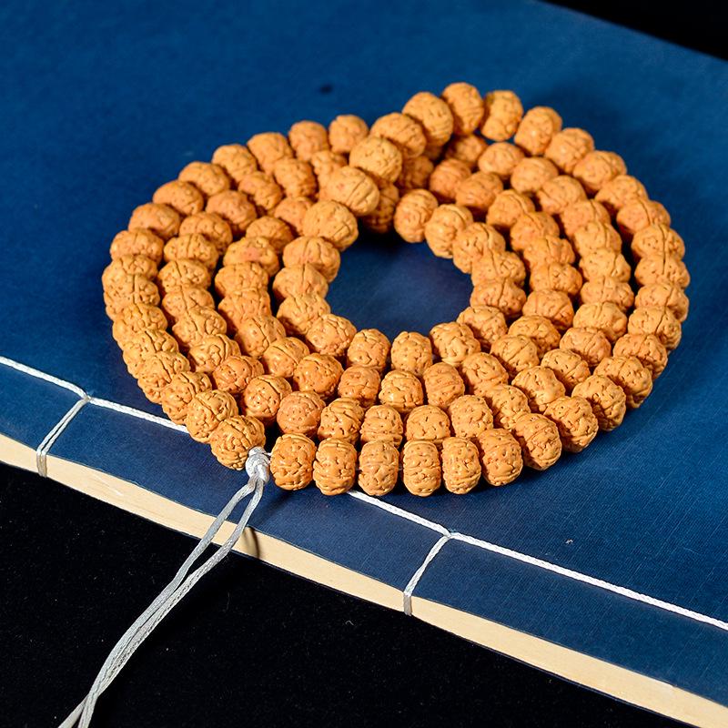 Handcrafted Dragon Scale Bodhi Seed Bracelet with Red Burst Finish